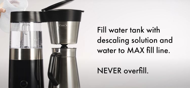 Fill the water reservoir with filtered water.